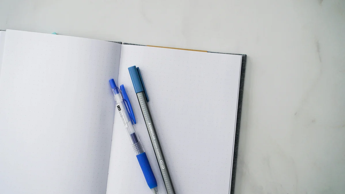 An open notebook with organized notes related to Google Open Knowledge Format